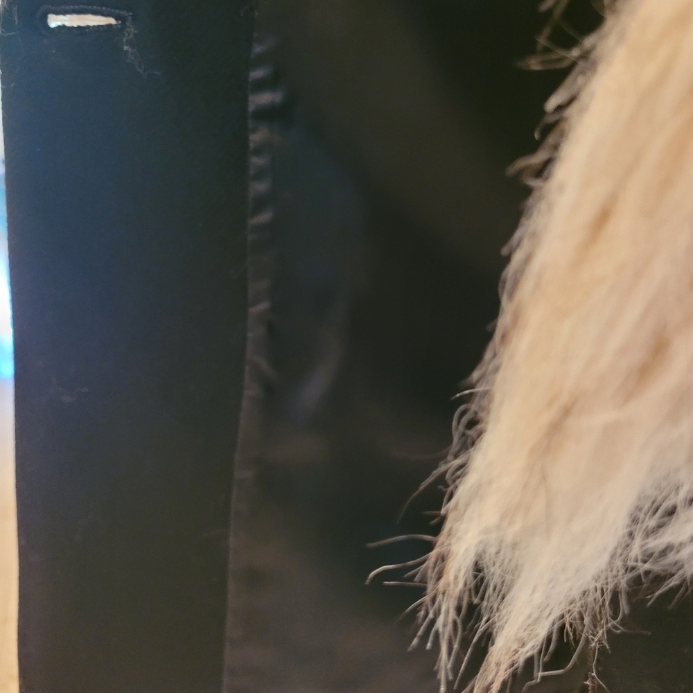 Love Moschino coat.  Back with faux white fur.  Size 6.